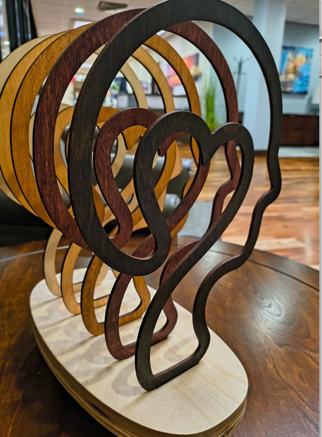 Side profile of the sculpture showing layered panels